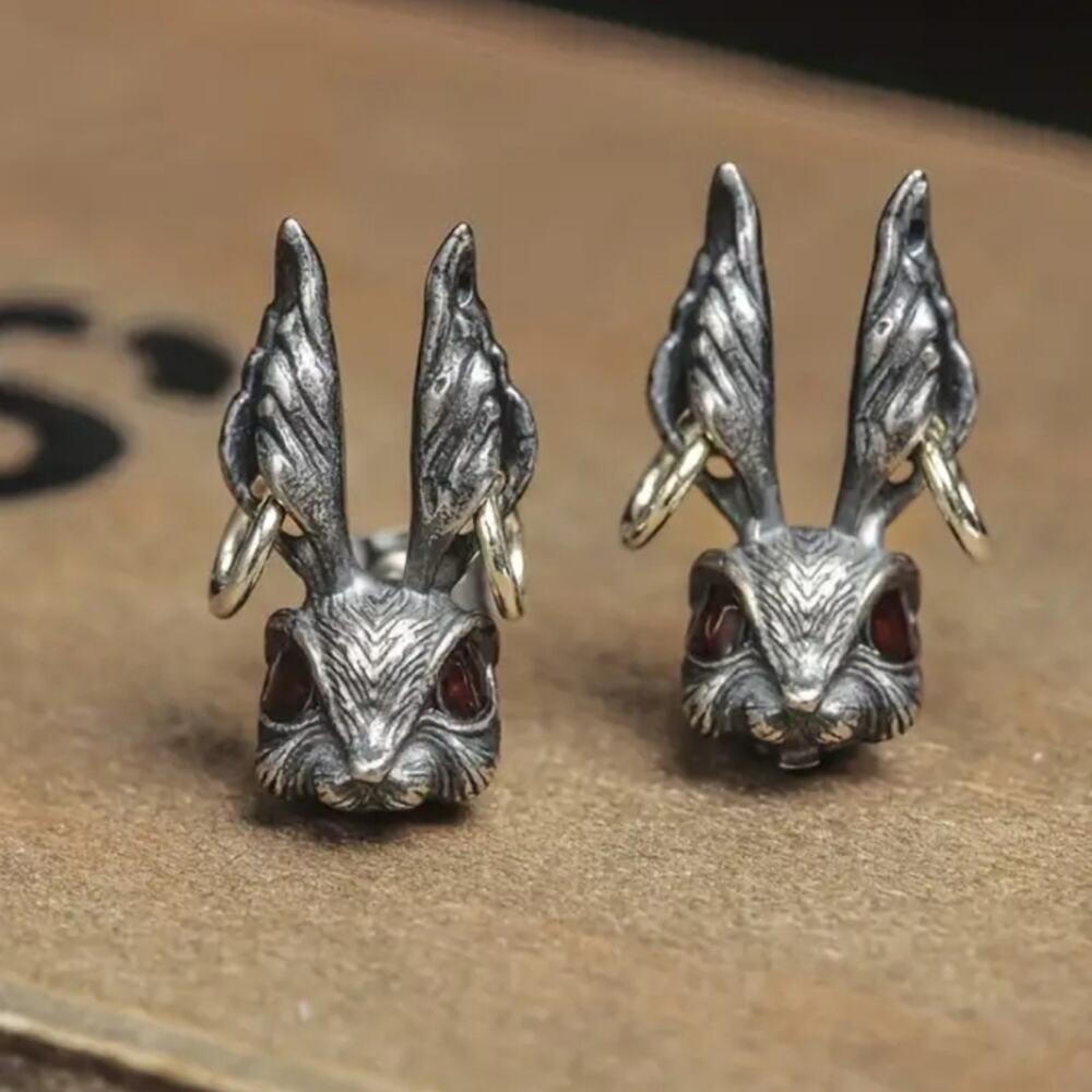 Evil gothic punk bunny rabbit with pierced earrings